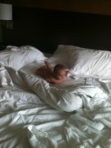 diaper free Jasmin enjoying the huge bed!